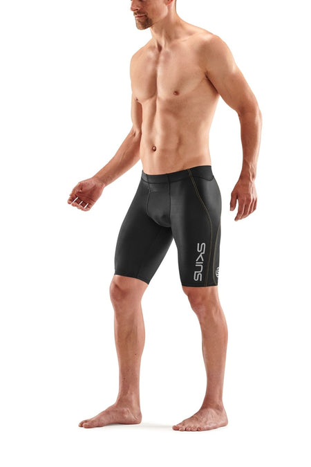 Skins - S3 400 Half Tight Kompressionshose Herren - black/yellow - SK - ST00300859052S - Sportbrands24