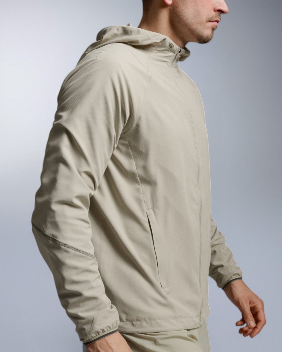2XU - Aero Hex Windbreaker Windjacke Herren - pebble/black reflective - 2X-MR7518A-PEB/BRF-XS - Sportbrands24