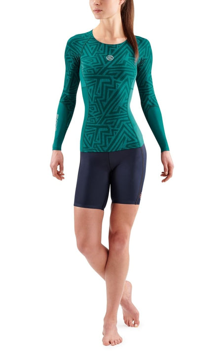 Skins - S3 Longsleeve Kompressionsshirt Damen - lt. teal angle - SK-ST40300050578XS - Sportbrands24