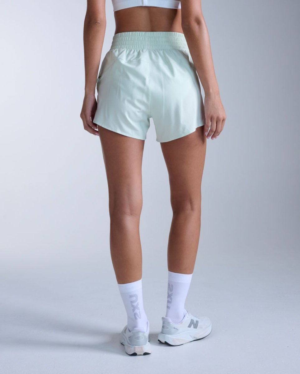 2XU - Aero Hi - Rise 4 Inch Shorts Laufhose Damen - mint dust/mint reflective - 2X-WR7458B-MND/MDR-XXS - Sportbrands24