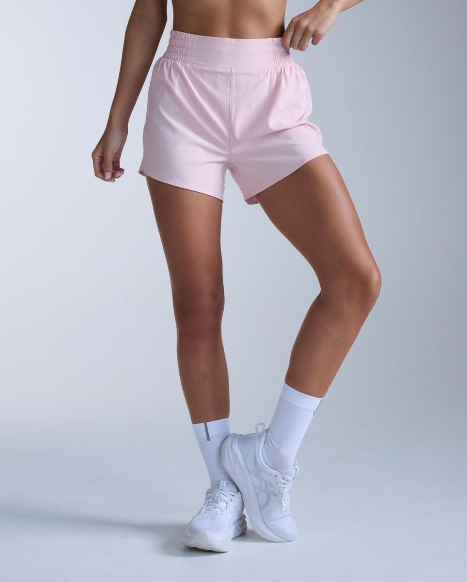 2XU - Aero Hi - Rise 4 Inch Shorts Laufhose Damen - pink frost/pink reflective - 2X-WR7458B-PIF/PRF-XXS - Sportbrands24